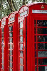 Fototapeta na wymiar Iconic red telephone boxes in central London