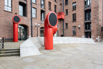 Liverpool, united kingdom May, 16, 2023 Red abstract tubes at Albert Dock.