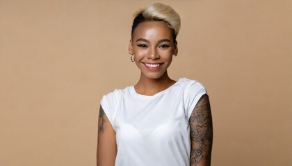 Smiling blond pretty smiling girl beauty female gen z model with short blonde hair beautiful face healthy skin and tattoo looking at camera wearing white top isolated at beige background