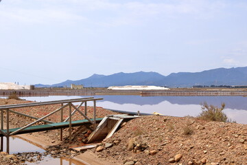 View of the cannels and work in salt pans near Cagliari, Italy