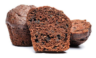 Whole and cut in half chocolate muffin isolated on white background. Chocolate chip muffin.
