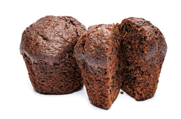 Whole and cut in half chocolate muffin isolated on white background. Chocolate chip muffin.