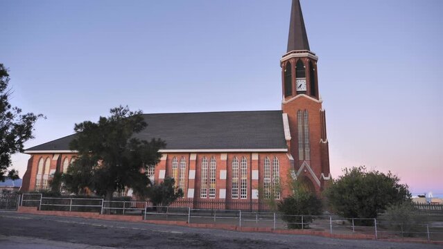 Side view of Fraserburg Dutch Reformed Church in soft evening light