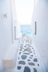 Mykonos, Greece. Wiew of whitewashed cycladic street in beautiful Mykonos town, Cyclades Greek Islands.