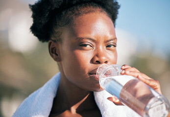 Face of black woman and drinking water for sports break, energy and workout, training and diet. Portrait of thirsty female athlete, bottle and nutrition for hydration, exercise and recovery of runner - obrazy, fototapety, plakaty