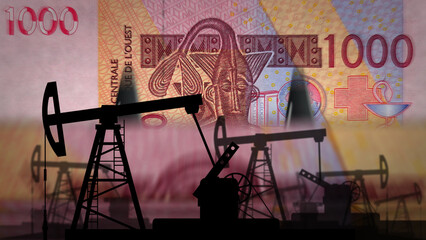 West African CFA Franc money counting with oil pump - Powered by Adobe