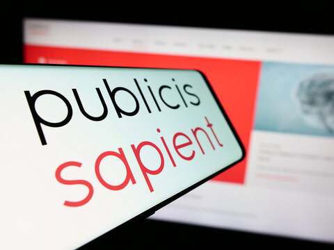 Stuttgart, Germany - 10-28-2023: Cellphone with logo of digital consulting company Publicis Sapient in front of website. Focus on center-left of phone display.