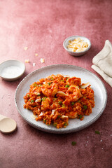 Spicy rice with coconut and shrimps