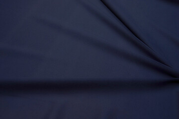 Abstract background texture of natural blue color fabric. Fabric texture of natural cotton or...