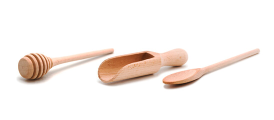 Wooden culinary spoon, scoop and honey dipper isolated on white background.	