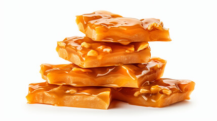 Stack of traditional peanut brittle candy pieces isolated on white background - obrazy, fototapety, plakaty