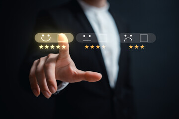customer service evaluation and feedback rating. costumer review concept, man using phone chooses happy smiling face..