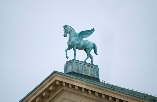 Poznan, Poland - 29 October 2023: Statue of Pegasus on the roof of opera.