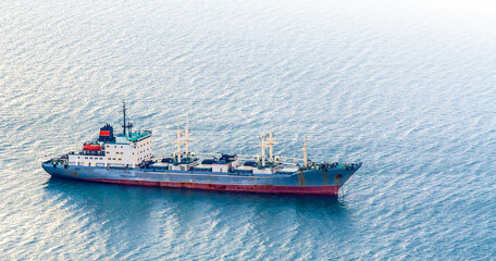 ship, receiving and transport refrigerator-supplier in Avacha Bay Kamchatka on soft sunlight