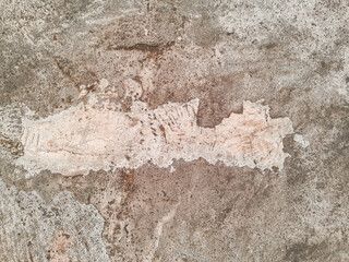 Grungy wall of gray concrete texture with cracked surface from sand and cement materials.