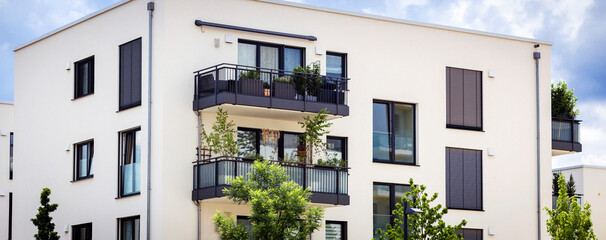 Modern Residential Building Facade Exterior Design in Germany with Modern Balcony, Windows with...