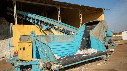 Fototapeta na wymiar big machine which transfer cotton to the industrial site