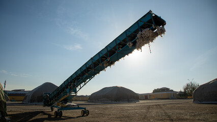 a huge cotton transporting treadmill