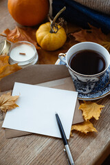 Blank form with pen. place for text. Blank sheet next to a cup of coffee. Top view, invitation to tea