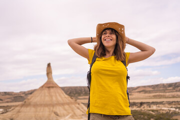 Happy woman relaxed in an arid national park