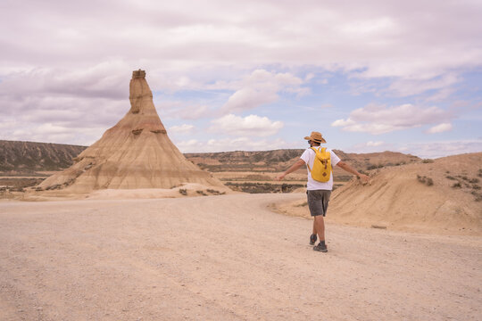 Man walking free along an arid national park