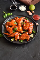 Grilled chicken wings on plate