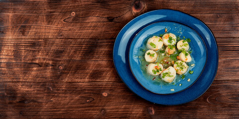 Scallops seared in garlic