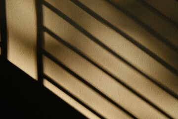 light hitting on a white wall, in a pattern .black and white background