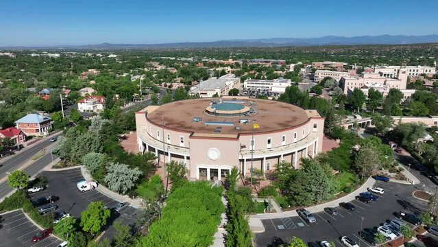 New Mexico state capitol building. Aerial orbit around round government building in downtown Santa Fe, NM.