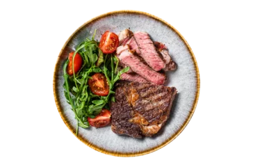 Foto auf Acrylglas Antireflex BBQ Grilled rib eye steak, fried rib-eye beef meat on a plate with green salad.  Transparent background. Isolated © Vladimir