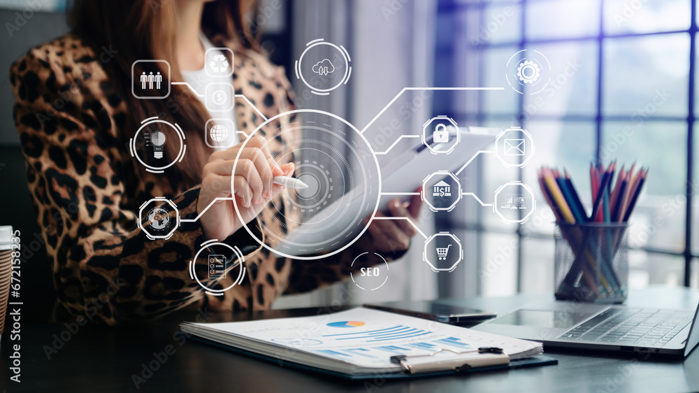 Poster businesswoman using smartphone and laptop and tablet computer with digital marketing media in virtua
