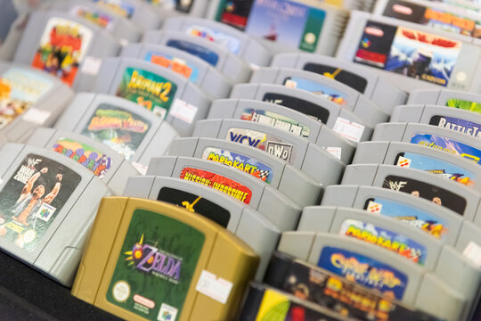london, uk 05/052019 Nintendo n64 video game cartridge collection on a table top sale. iconic retro vintage video gaming machine. Japanese technology 64 bit game