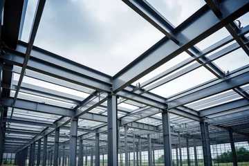 Fotobehang roof of a greenhouse. interior of a building, design of steel frame structural systems © Denis