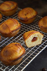 Pasticciotto leccese pastries filled with egg custard cream and sour cherry jam close up