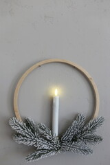 Сhristmas decoration candle on the wall