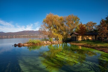 Obraz premium Autumn view of Varese lake in the pre-Alpine region in Lombardy, Italy