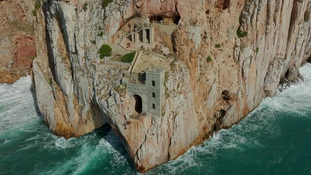 Porto Flavia: close-up aerial view of the old mining port on the island of Sardinia.