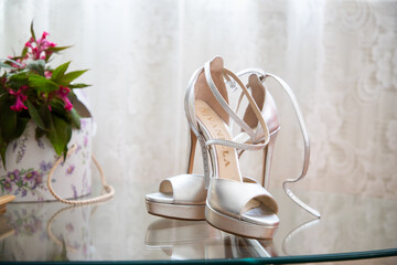 bridal shoes and wedding rings