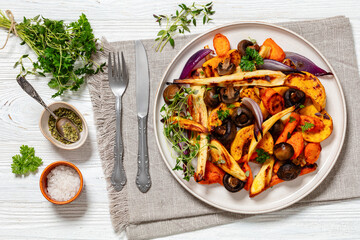 baked winter veggies and mushrooms on a plate