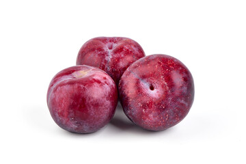 Obraz premium Sweet red plums, isolated on white background.