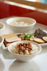 Braised meat over cooked rice, famous and delicious street food in Taiwanese restaurant.