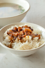Braised meat over cooked rice, famous and delicious street food in Taiwanese restaurant.
