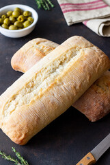Ciabatta on a rusty background. Italian food. Bread. Vegetarian food.
