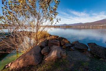 Autumn view of Varese lake in the pre-Alpine region in Lombardy, Italy