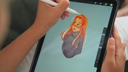 Digital artist draw pc tablet close up. Designer paint red head girl pic. Illustrator use ipad...