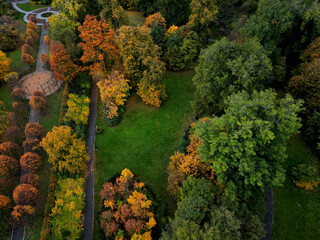 the access road to the landscape park with a roundabout is the residence. the stones placed in a...