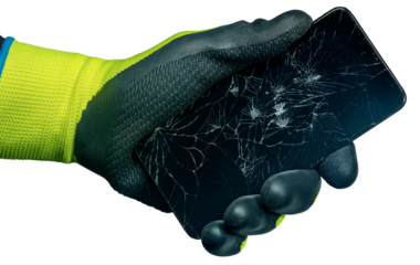 Hand with green and black protective work glove holding a modern smartphone with the broken touch screen, isolated on white or transparent background, png.