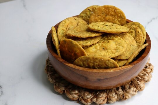 Crispy and crunchy methi mathri is a popular tea time snack in northern parts of India. It's especially popular during the Diwali festive season. It's a savory cracker made using Maida and Fenugreek. 