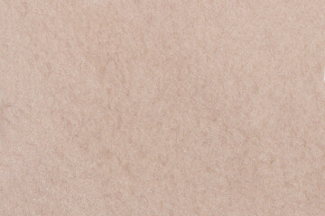 Pink polyester plush fabric texture. Material for making clothes and toys close up. Image for your...