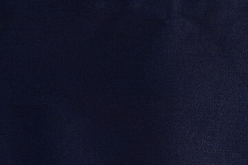 Texture of dull blue denim fabric for making jeans. Background for your design. Materials and fabrics concept